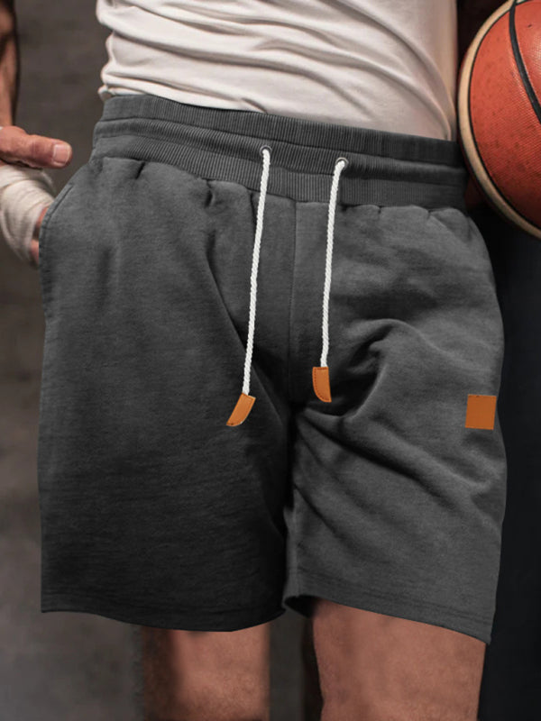 Nuovi pantaloncini sportivi casual da uomo con coulisse, spazzolati e morbidi come la pelle kakaclo